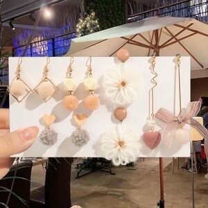 Elegant Gold and Cream Pom Pom Earrings